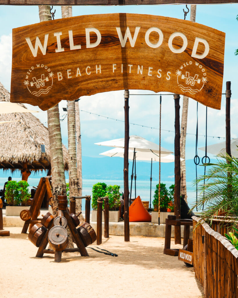 wild wood sign, beach fitness, fitness equipment, paradise gym, yoga koh phangan